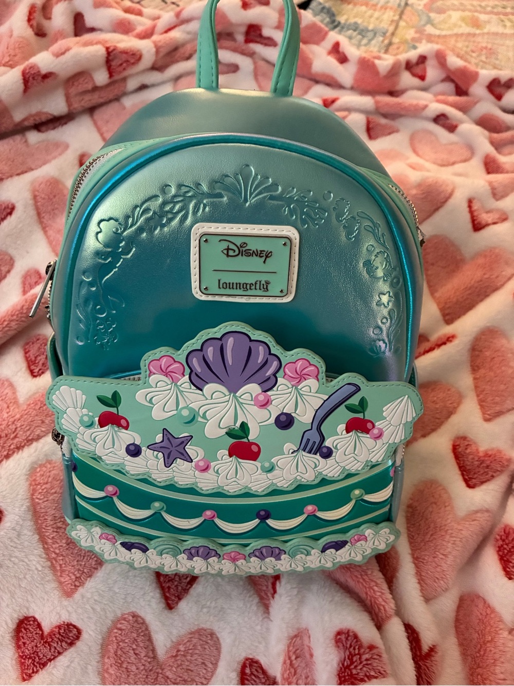 Loungefly Kids Ariel Seashell Cake Mini Backpack in Teal with Purple Accents